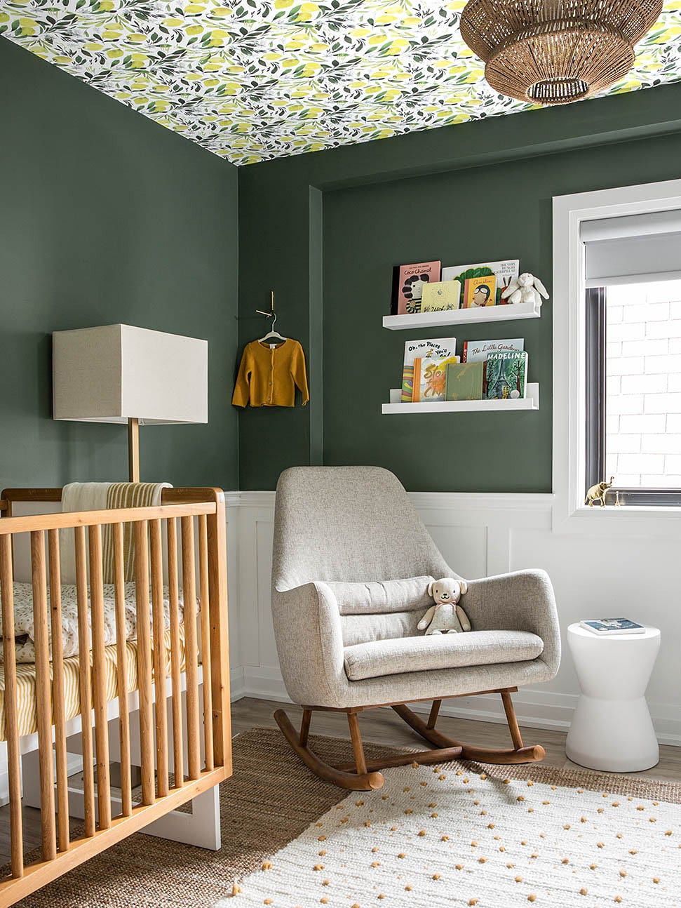 forest green nursery with wallpapered ceiling