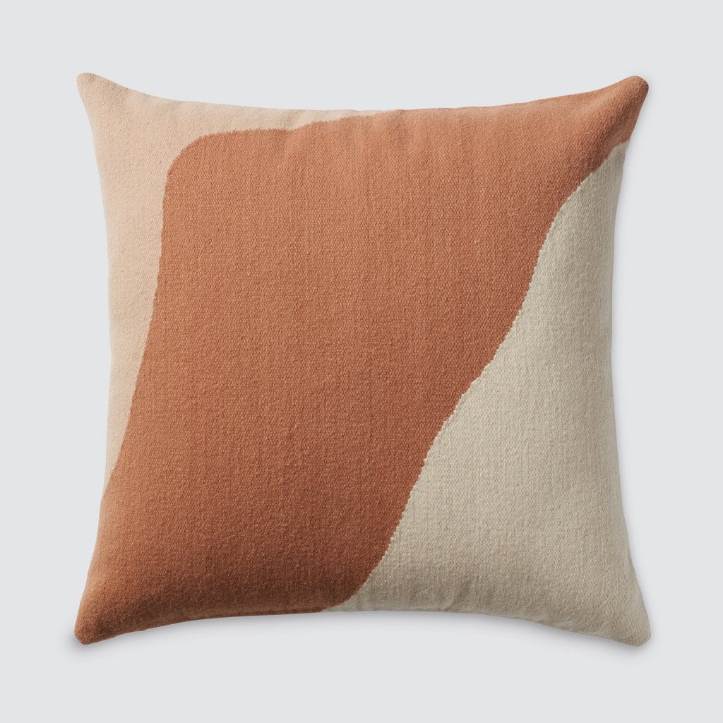 orange and white throw pillow