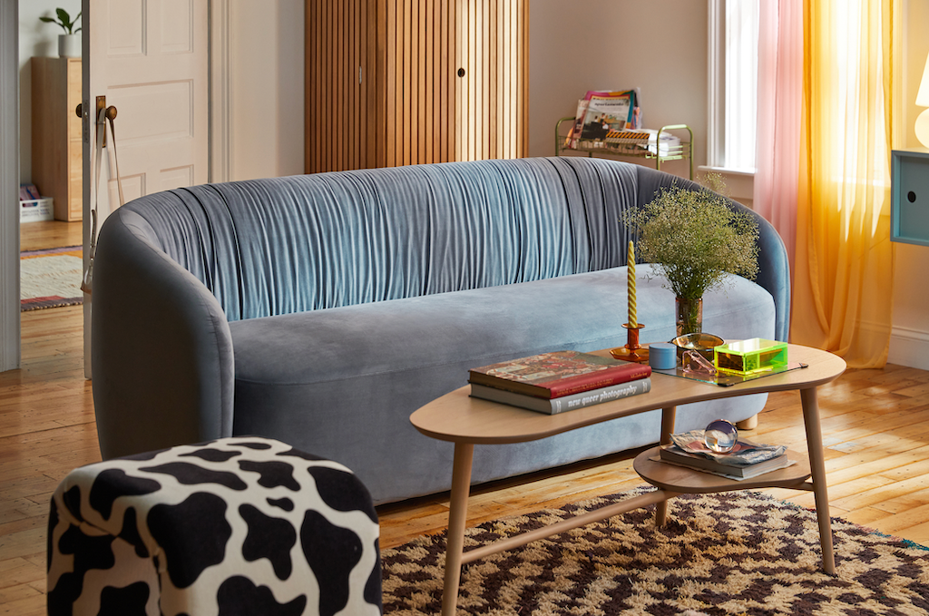 living room with blue couch