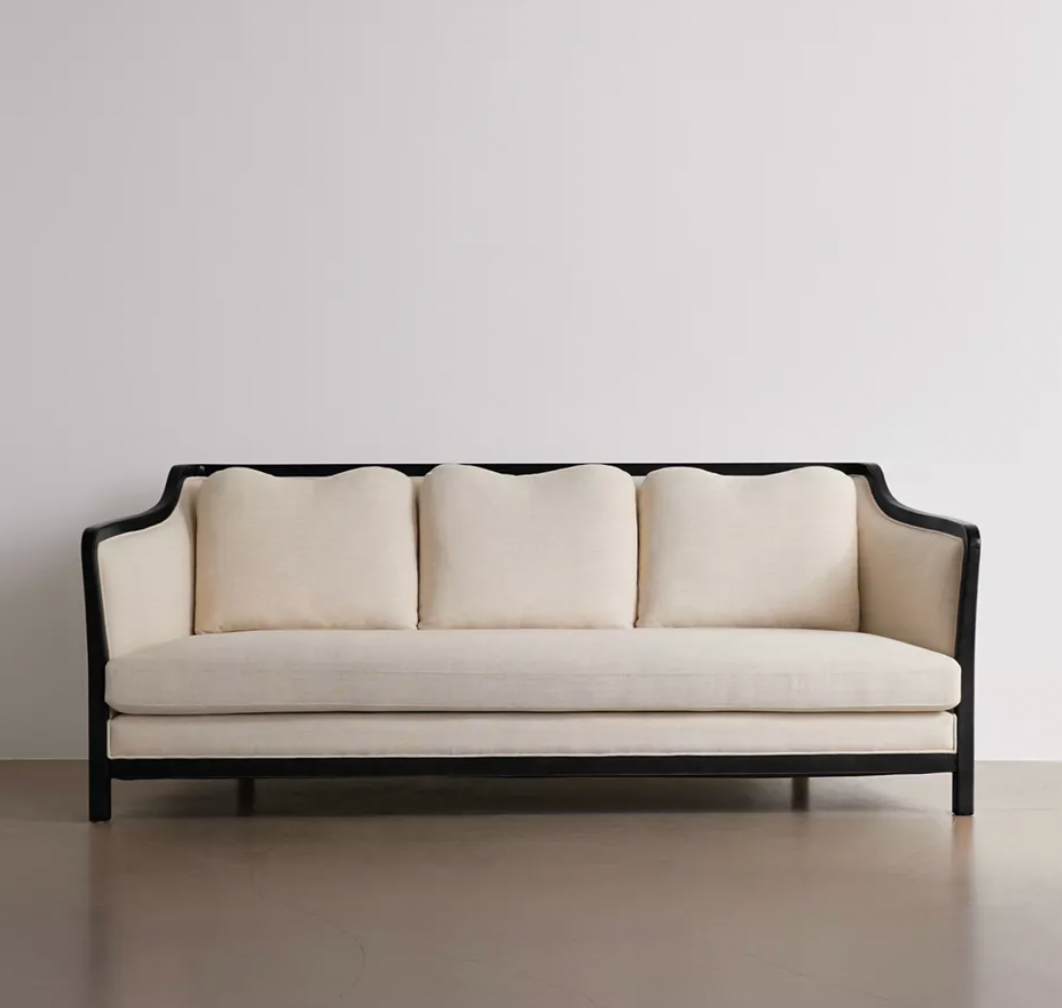 cream upholstered sofa