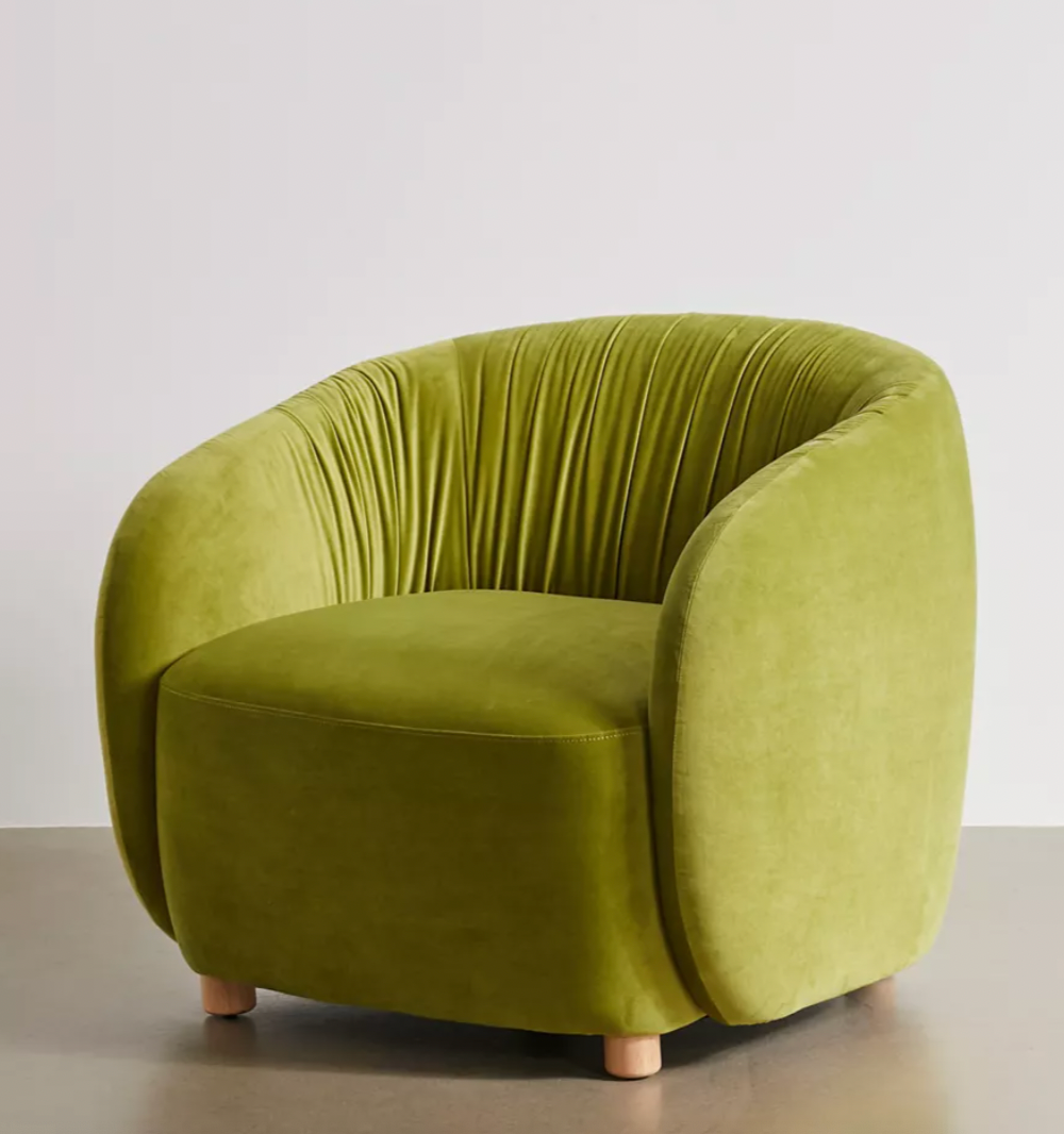 green upholstered armchair