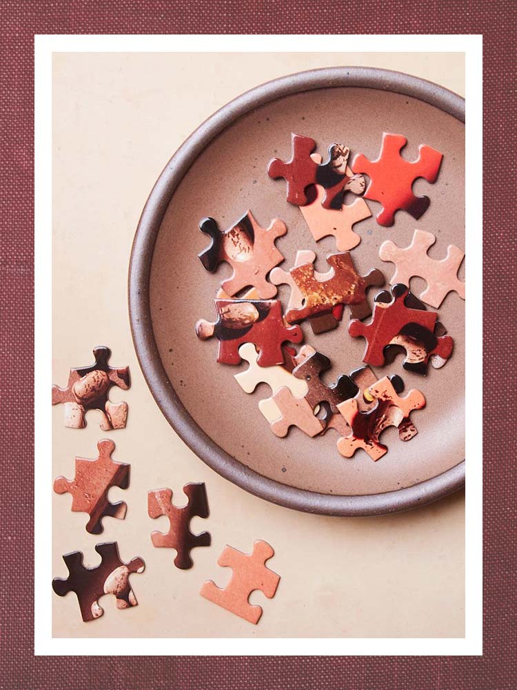 Puzzle pieces on a ceramic dish