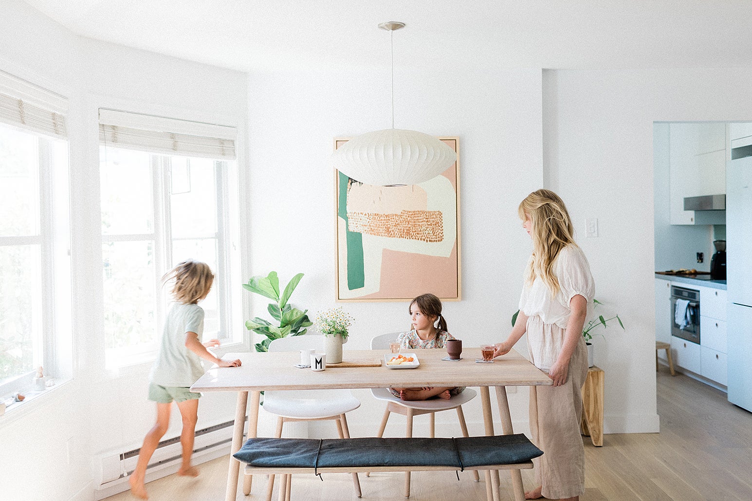 woman and kids at table
