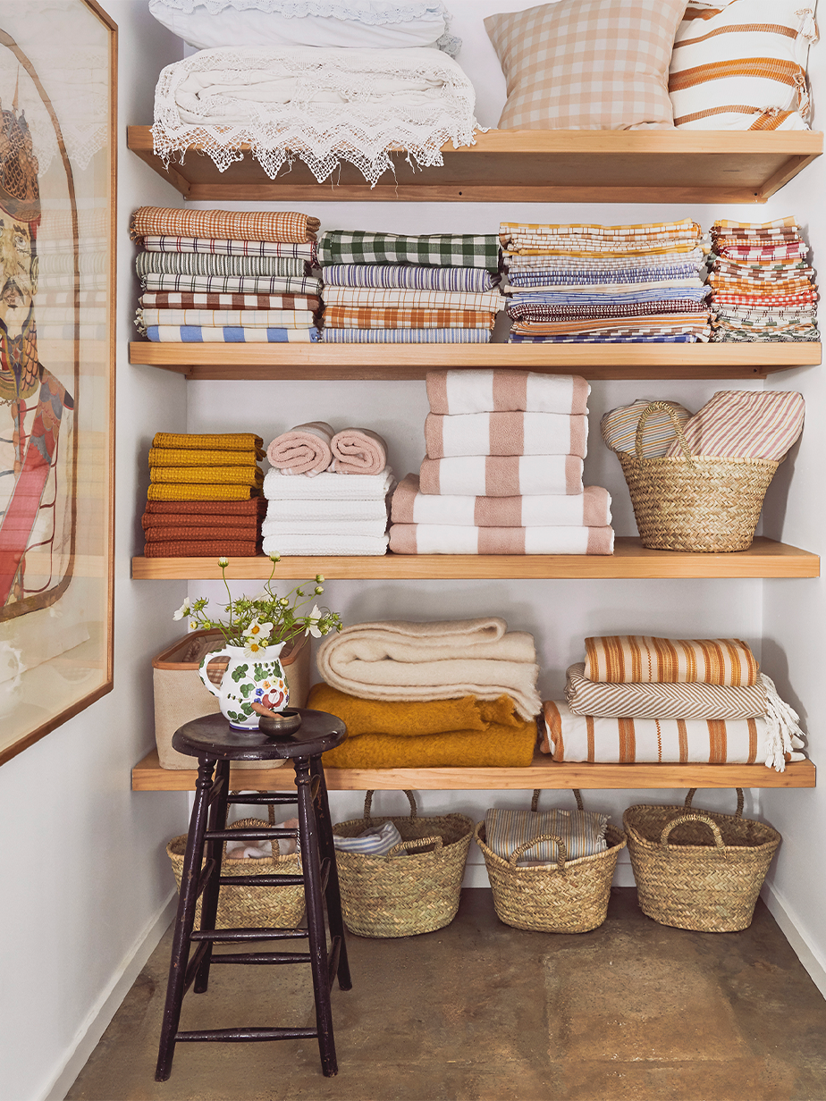 Linen closet with towels and blankets