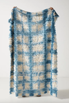 White and blue throw blanket