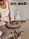 woman making ceramics
