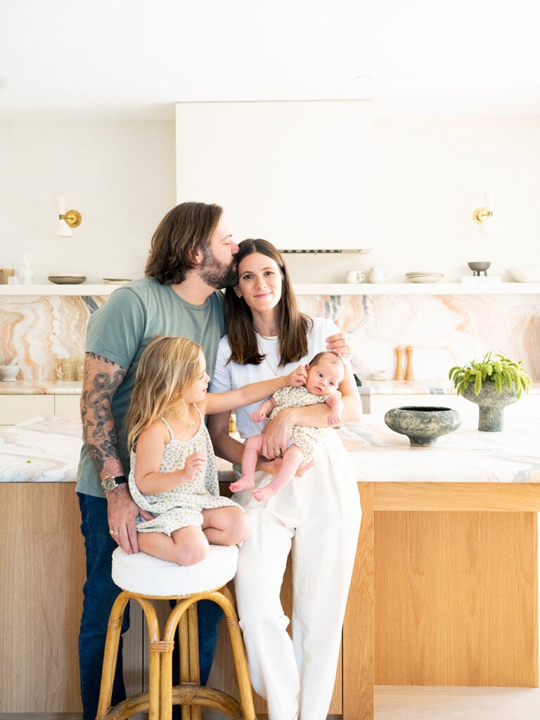 family with two kids in kitchen