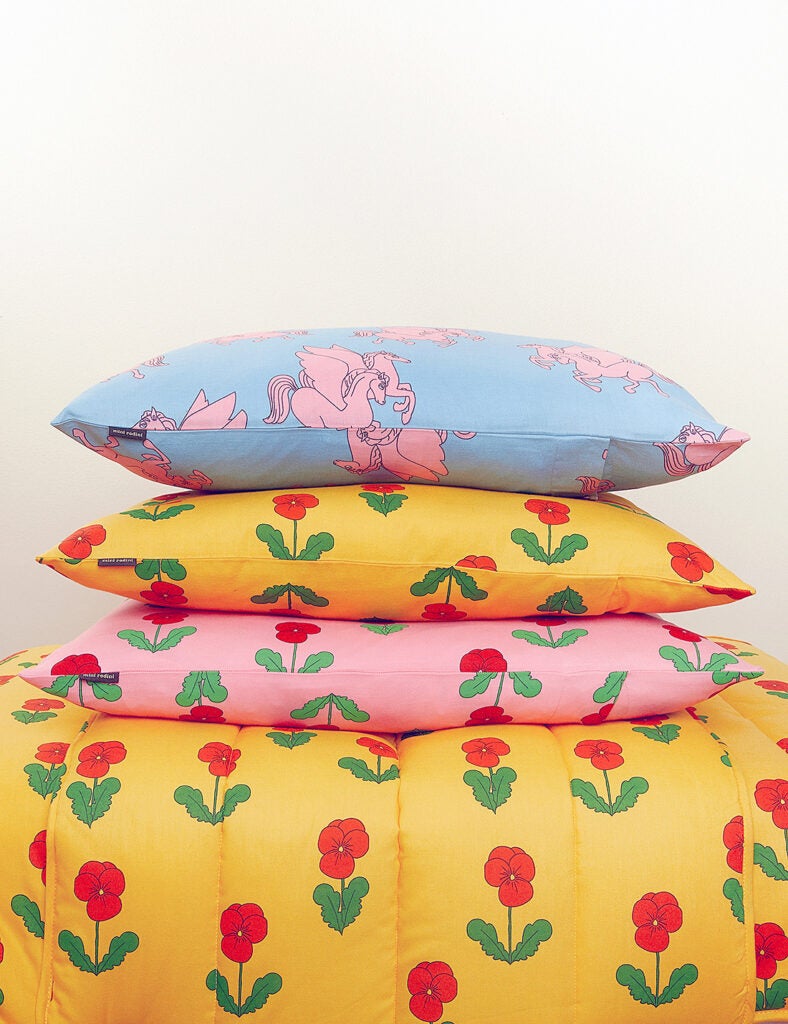 stack of patterned pillows