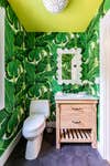 palm leaf wallpapered bathroom in Long Island