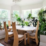dining room with high back rattan chairs