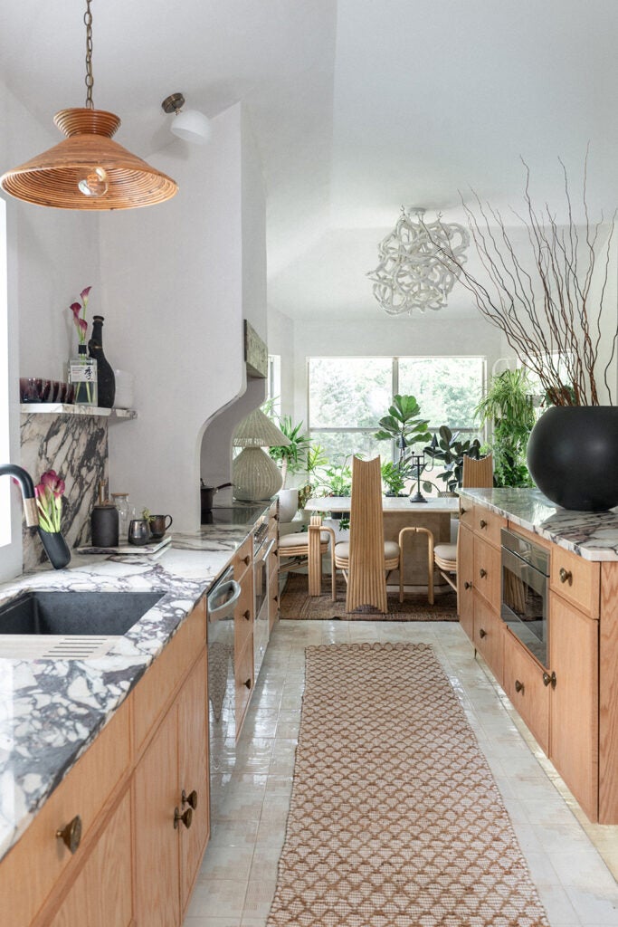 Funky Marble and Rattan Lighting Shook Up This Builder-Grade Austin Kitchen