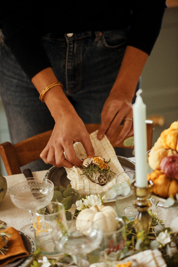 table setting for Thanksgiving in Heloise Brion's kitchen
