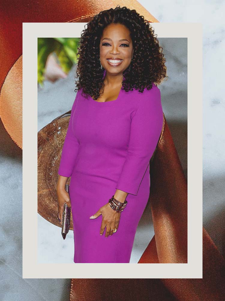 Oprah Winfrey wearing a pink dress, portrait