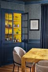 Blush dining chairs in velvet in dark blue dining room