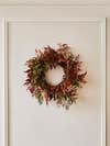 wreath with red and green leaves