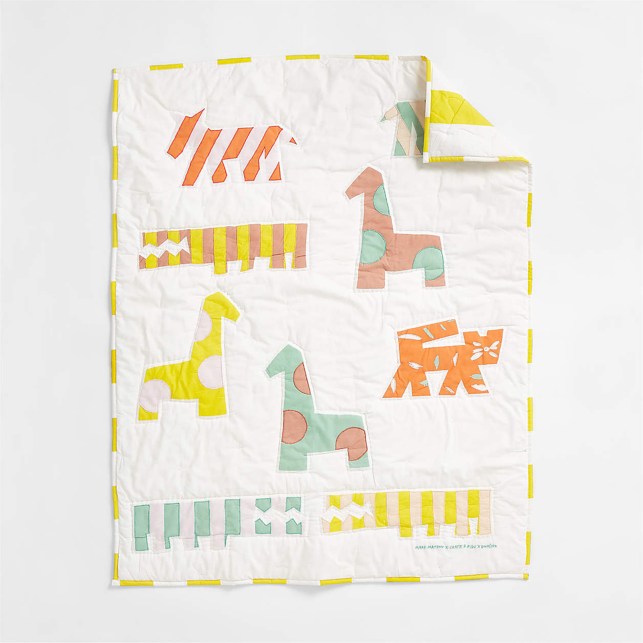 quilted blanket with soothing colors for babies