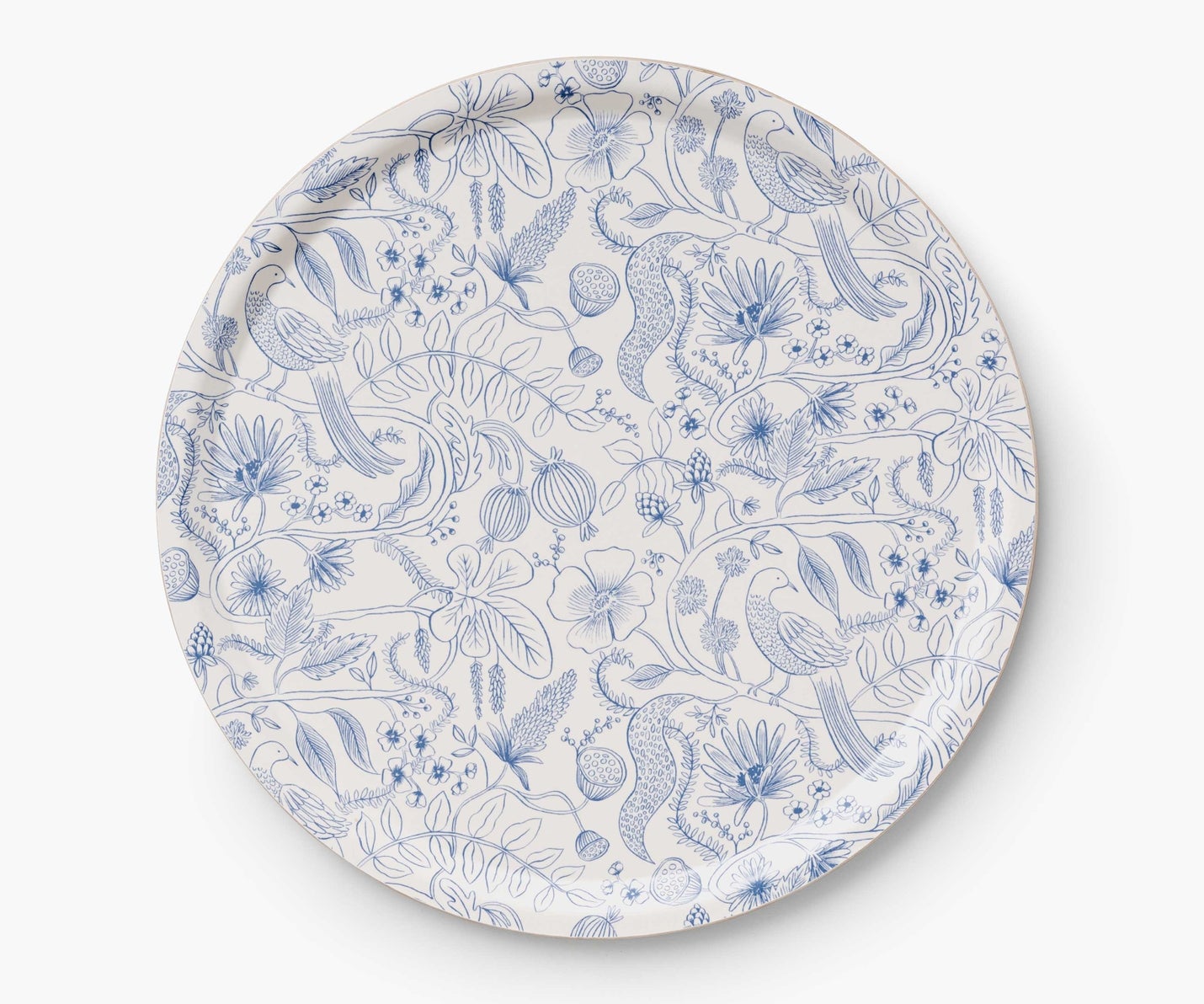 blue and white plate with flower patterns