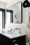 bathroom with white double sink