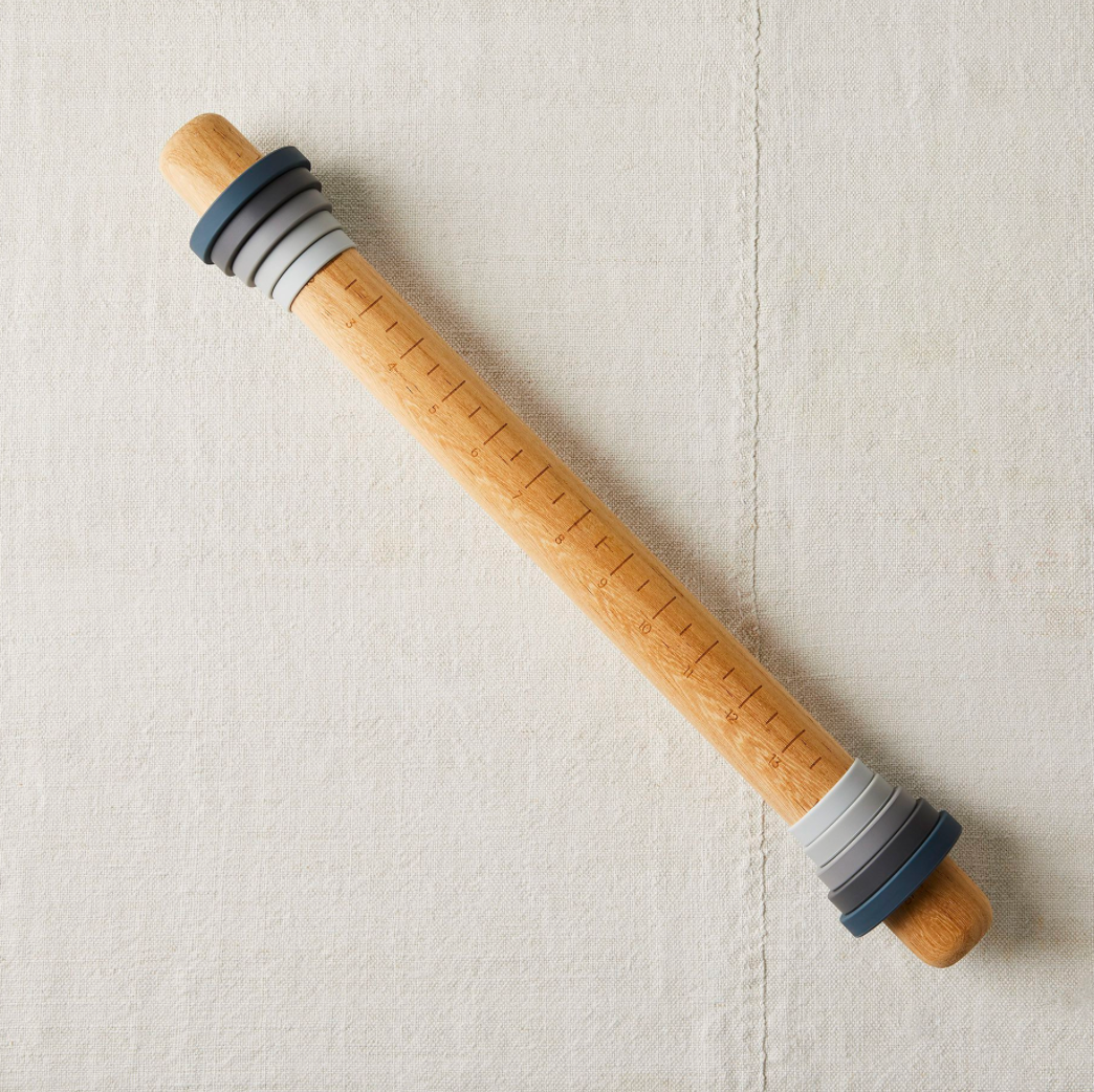 wooden rolling pin with thickness gague