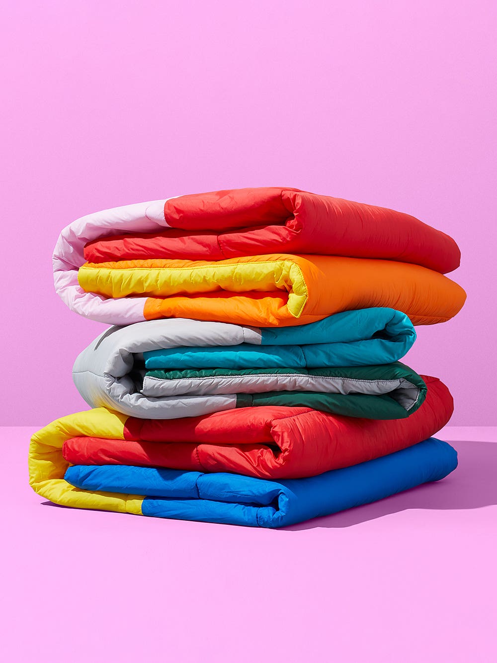 stack of color blocked throw blankets