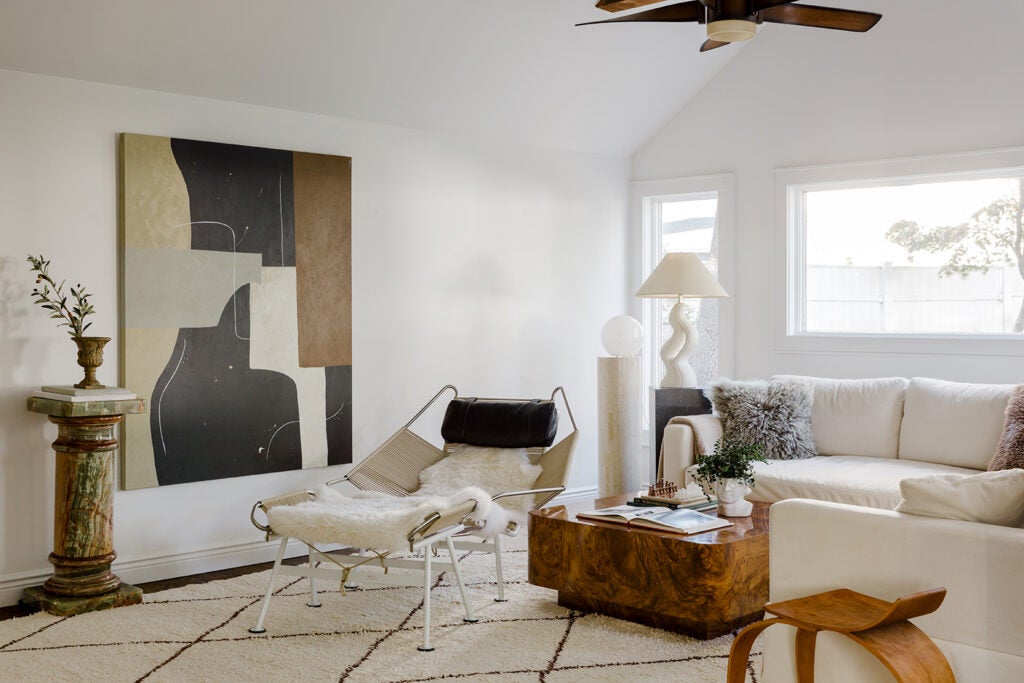 white living room with abstract art