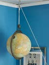 globe hanging in corner