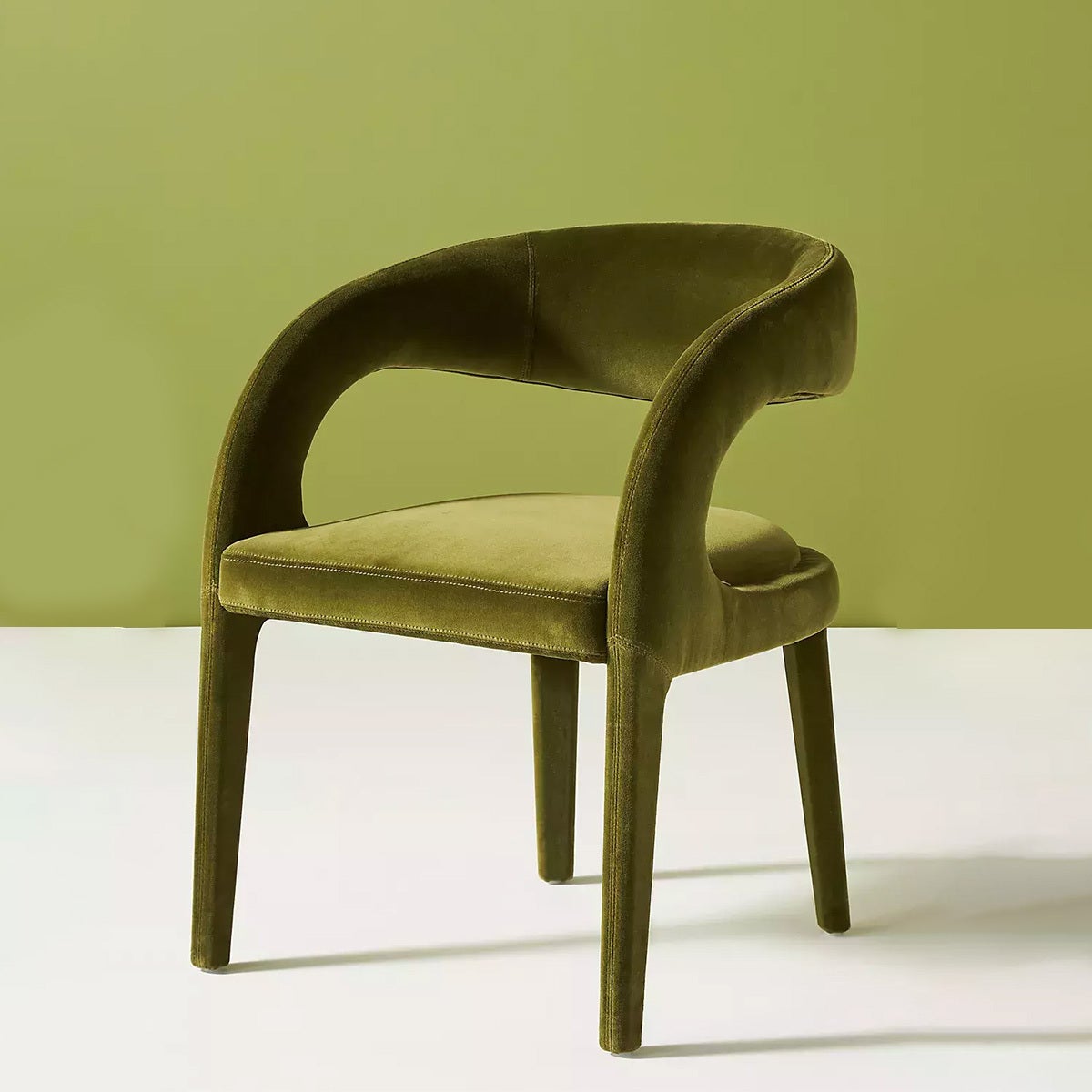 Green velvet chair by Anthropologie