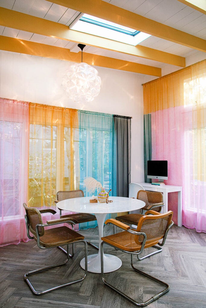 dining room with colored curtains