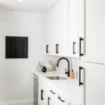 white kitchen wiht black hardware