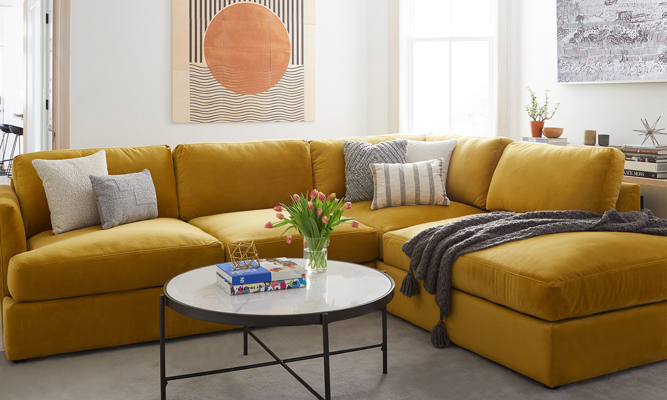 Ocre sofa with white coffee table