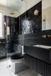 black tiled bathroom