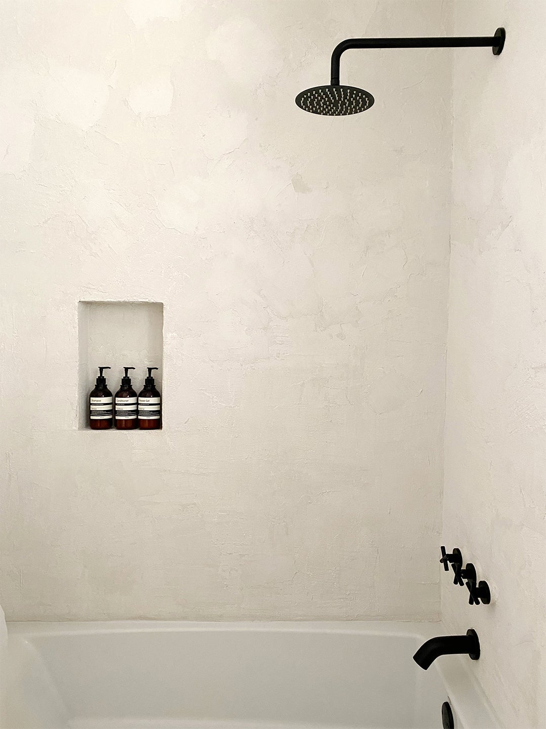 white textured tub-shower