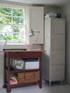 window with work table and filing cabinet