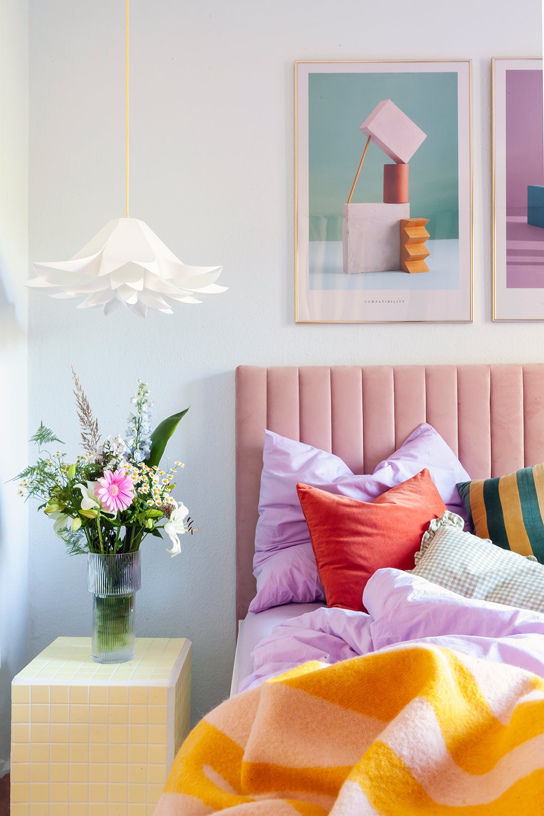 pink tufted bed