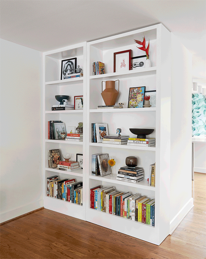 gift of bookcase swinging open to reveal bar