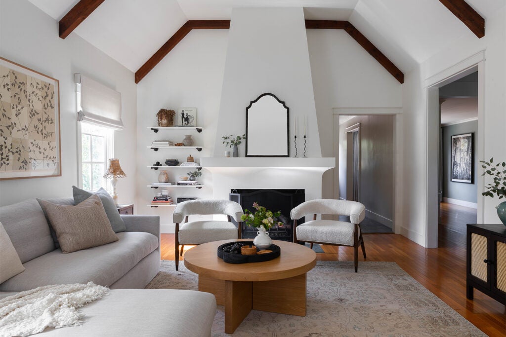 white living room with tapered fireplace