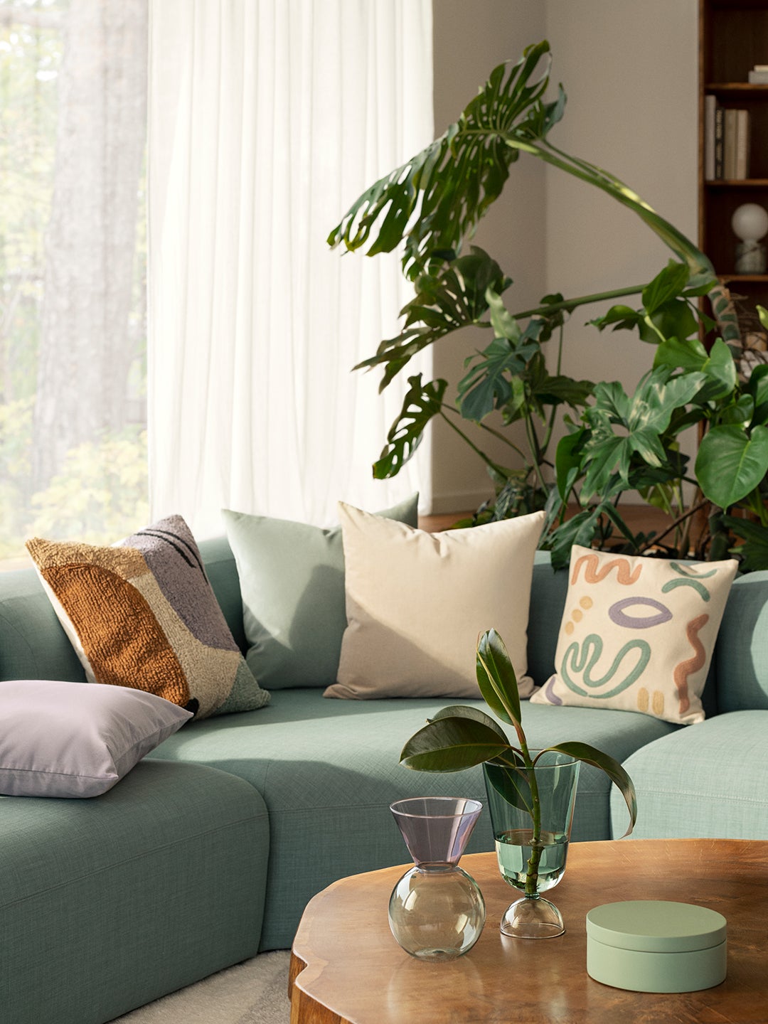 living room with pale green sofa