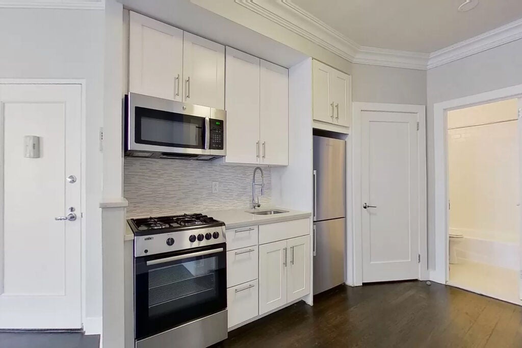 plain white apartment kitchen