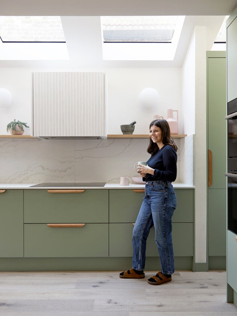 woman standing in kitchen