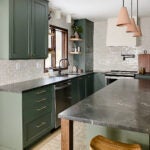 kitchen with island and green cabinets