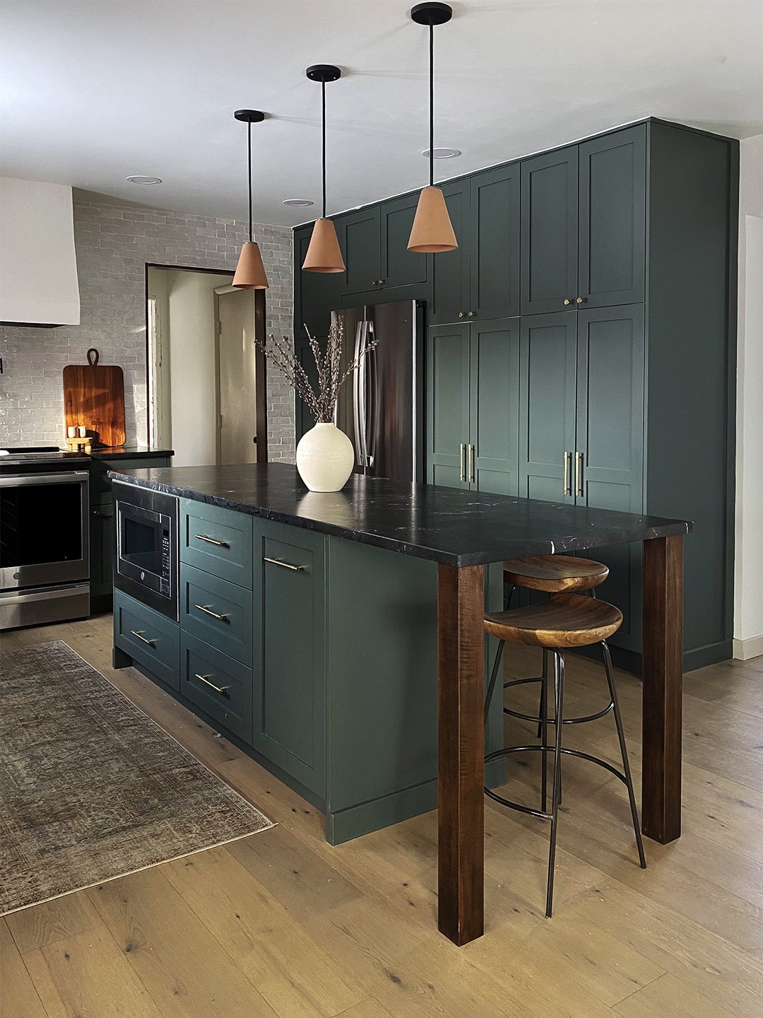 One Shade of Green and Three Types of IKEA Cabinets Transformed This 1980s Kitchen