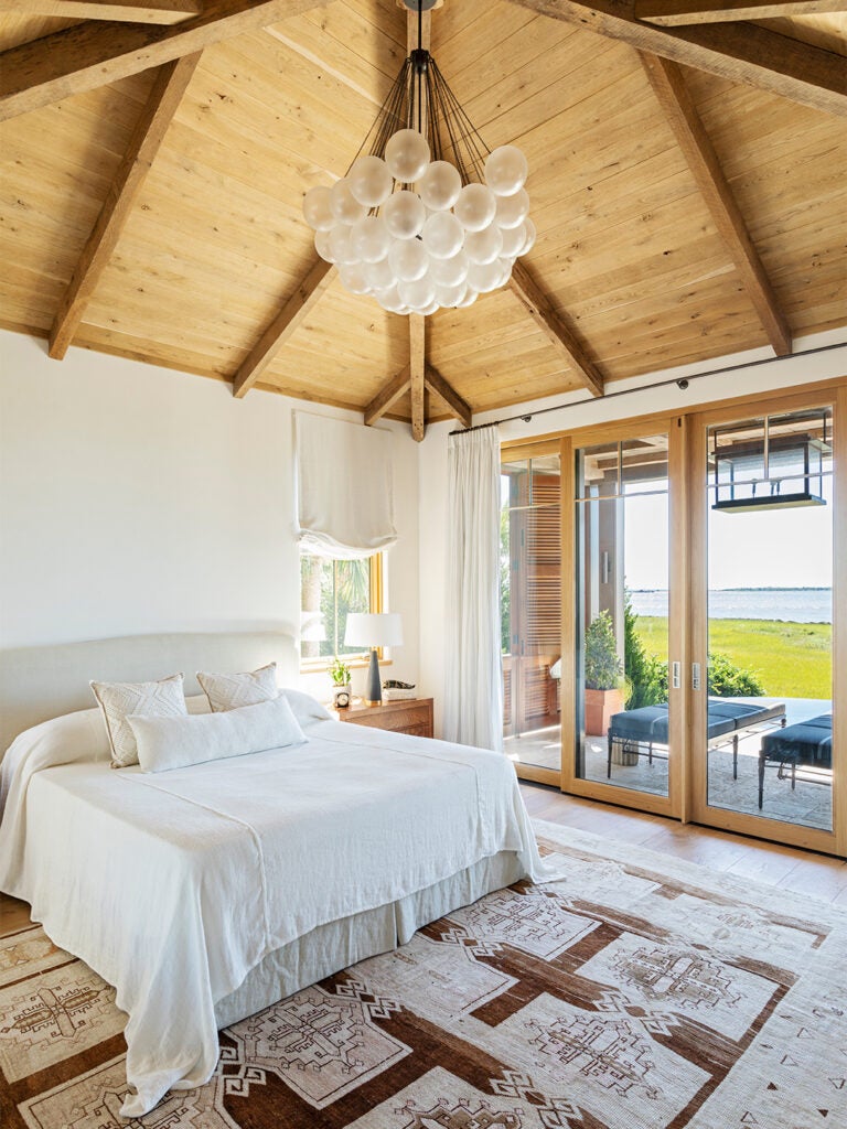 bedroom with pitched wood ceiling