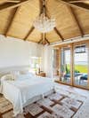 bedroom with pitched wood ceiling