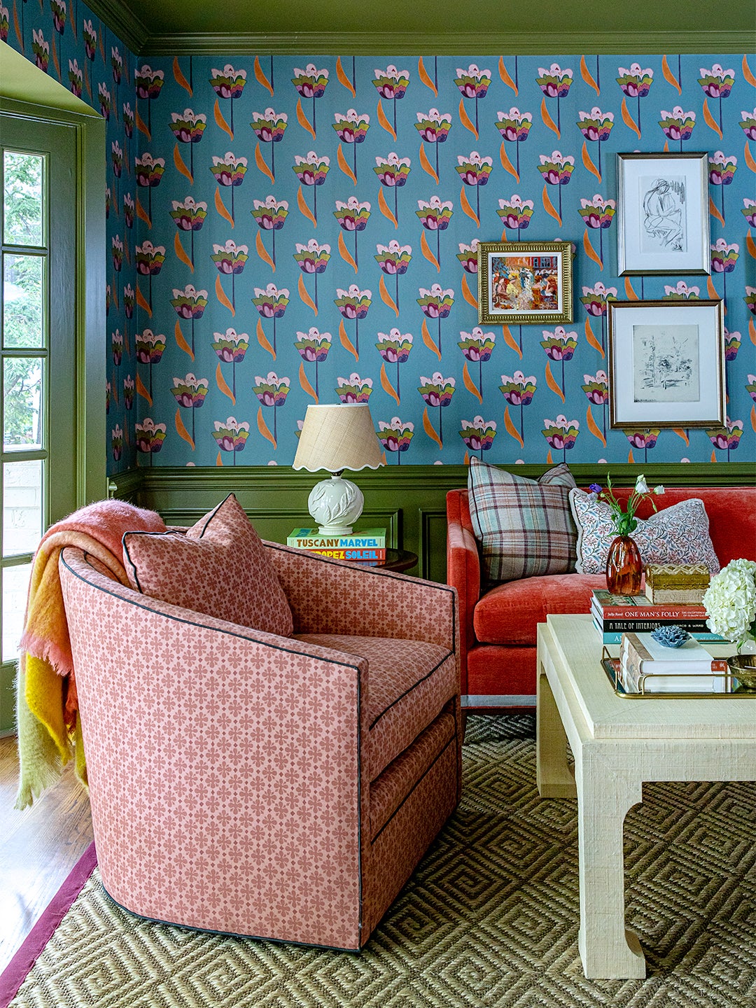 Floral Wallpaper Room with Red Sofa and Pink Chair and Green Trim