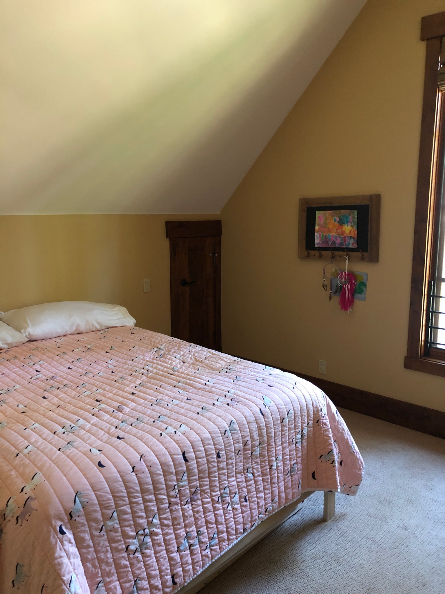 bedroom with pink duvet