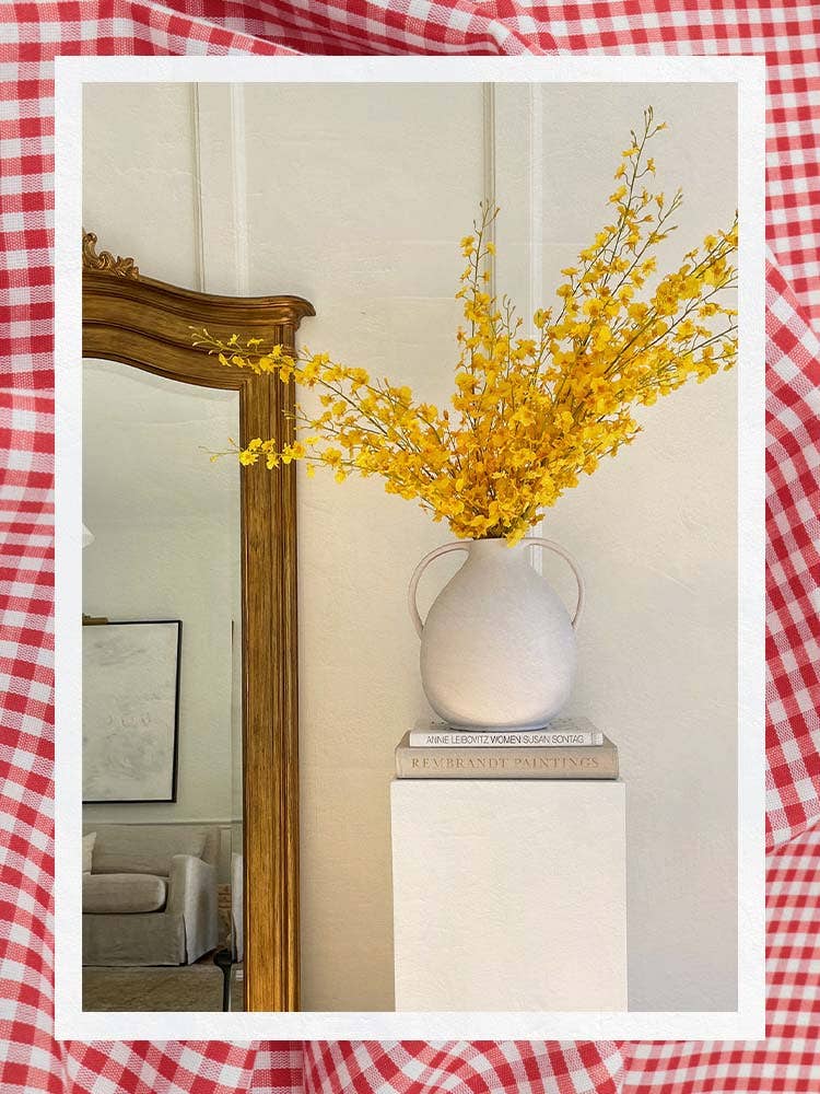 Yellow Fake Flowers in White Vase