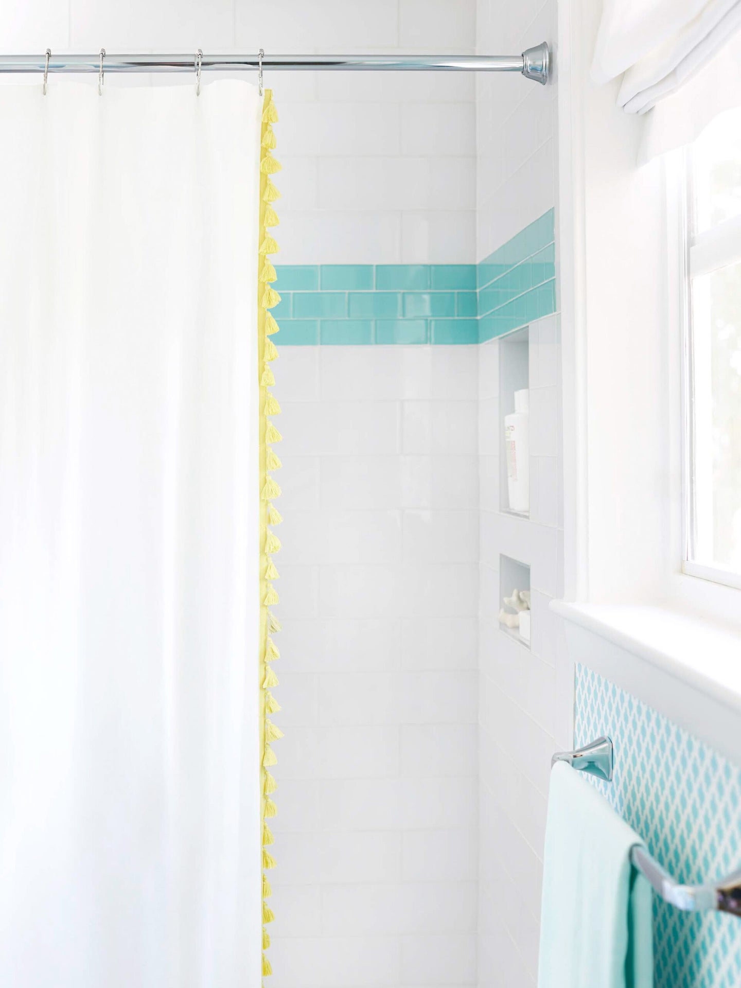 white bathroom shower curtain opened white and turquoise striped tile