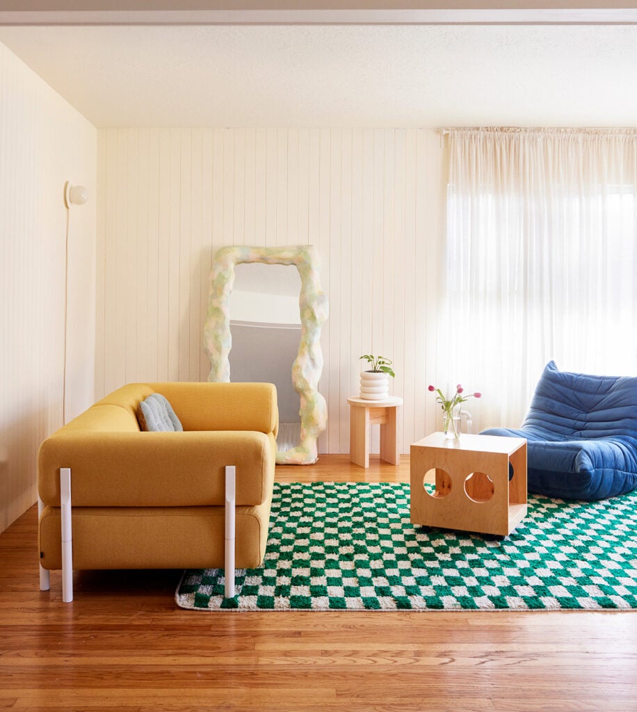 sheer curtains orange living room sofa checkered area rug