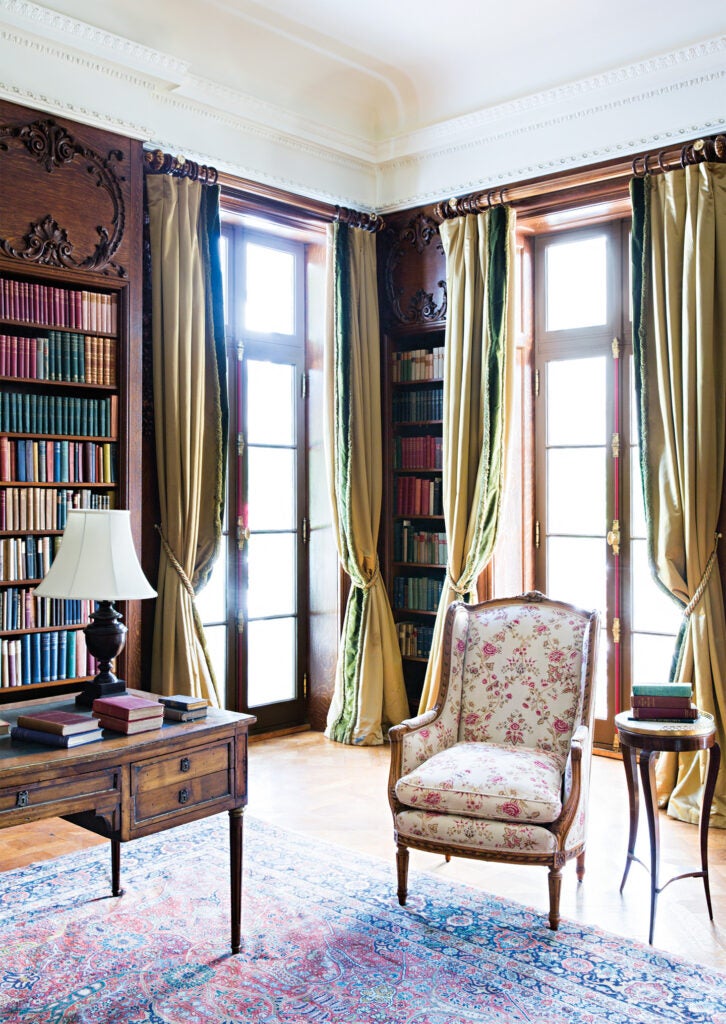 floor-length drapes in vintage boho home library