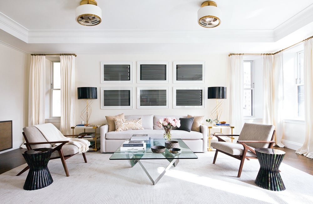 neutral living room with long cream pleated linen drapes